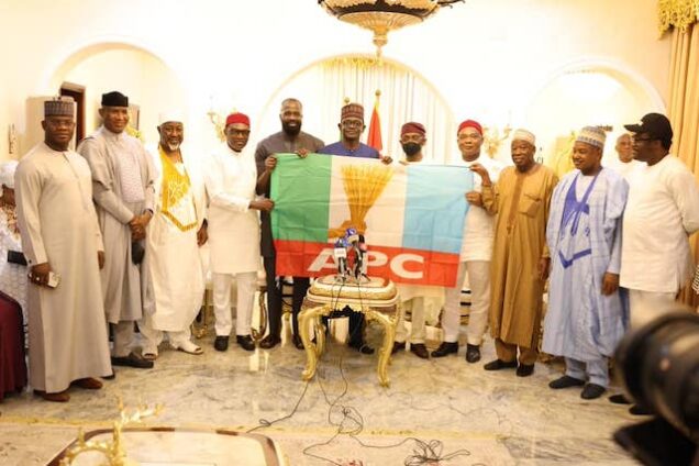 APC flag bearer Andy Uba, 4th left, Buni, middle and some of the defectors
