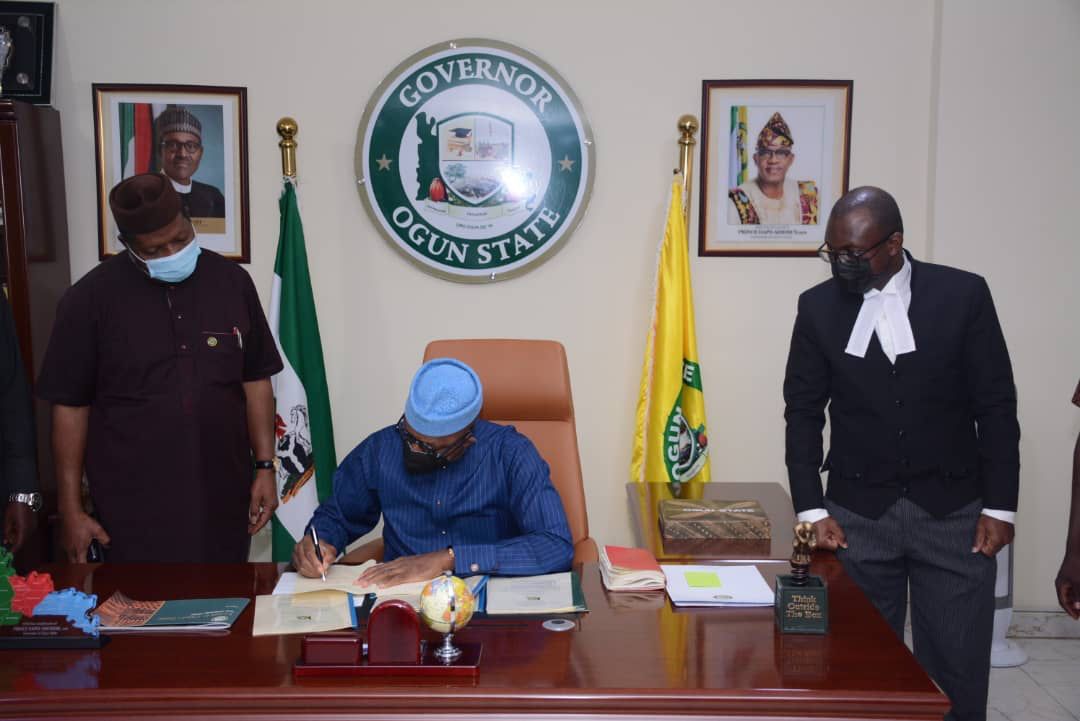 Abiodun signing the bill into law
