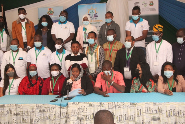 Ms Nisreen Al Sayeem from Sudan reads the CSO statement against moves by the UK viewed as a ploy to limit Africans at COP26