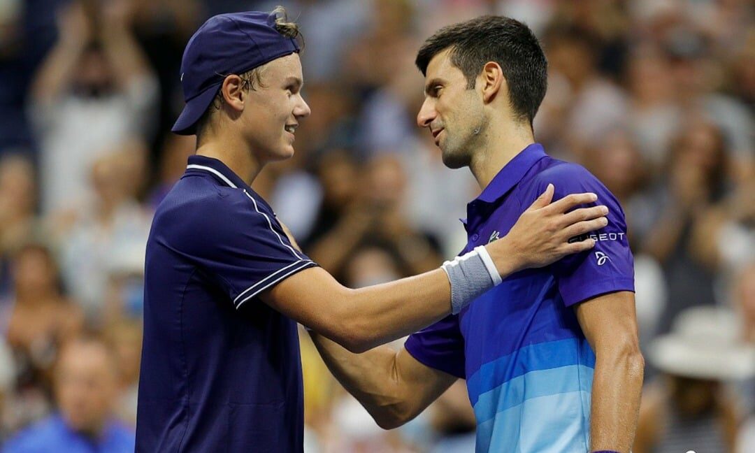 Djokovic salutes Holger Rune, left, for his efforts