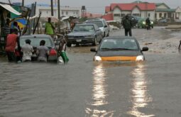 File: Flooded road in Benin in 2018