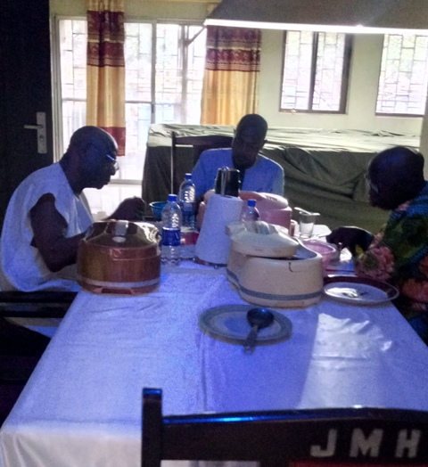 Gen Alabi-Isama dining with his visitors