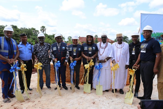 A cross section of Special Guests at the occasion perform the Groundbreaking Caption 2: Director, InnerCity Mission Pastor Omoh Alabi addresses the audience during the ceremony