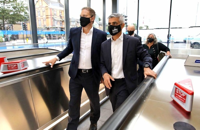 Mayor Sadiq Khan, right at the Battersea station