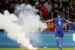 Objects including a flare thrown on the pitchat Budapest in Hungary v England