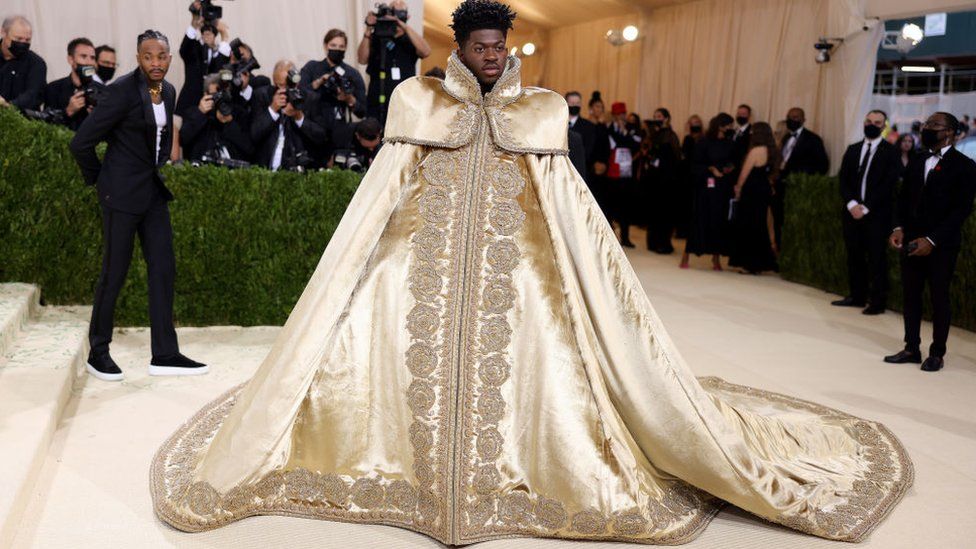 Rapper Lil Nas X first served up a regal robe...