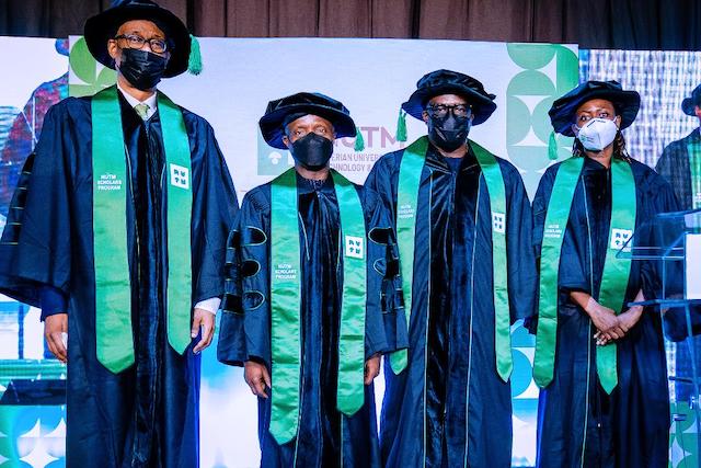 (l-r) Chairman NUTM Board Mr. Okey Enelamah, Vice President Yemi Osinbajo SAN, Mr. Adeyemi-Bero and Dr. Mobola Johnson at the Nigerian University of Technology and Management’s Founding Class of 2021 Scholars Graduation Program in Lagos, Nigeria. 