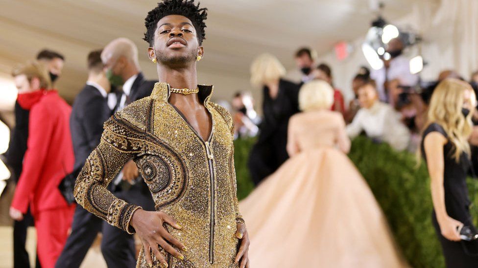 Lil Nas then shed the robe for a sequined bodysuit