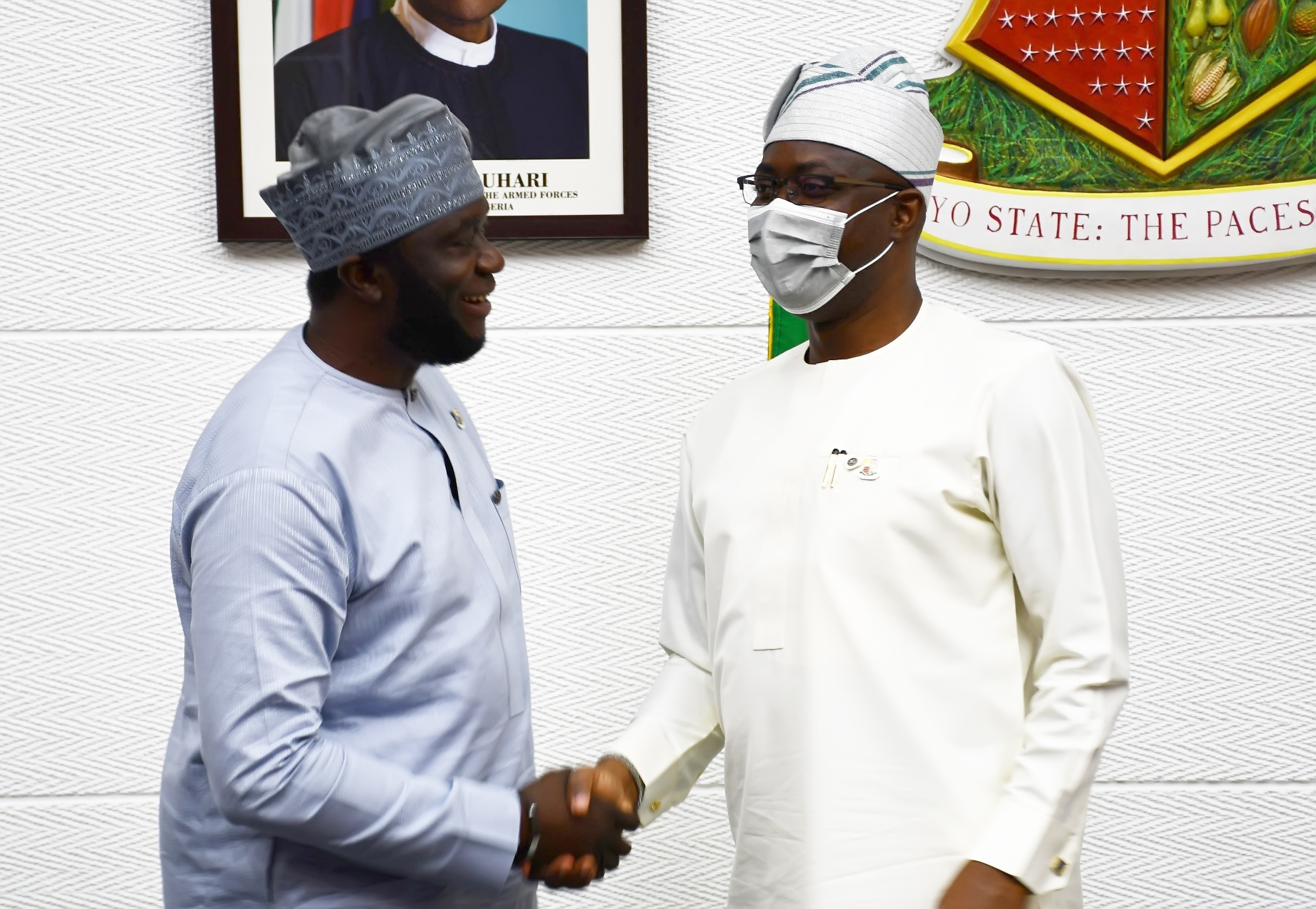 Oyo State Governor, Seyi Makinde (right) and one of the newly appointed commissioners Mr Abiodun Oni during the swearing-in held at Governor's Office, Secretariat, Ibadan.