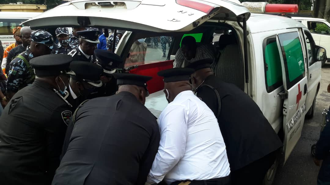 The remains of the police Odumosu with family of the deceased officer in an ambulance for burial
