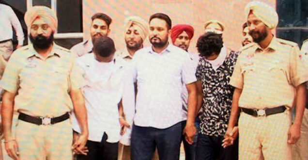Abu Henry, 2nd left, and his Indian accomplice, 2nd right, when arrested in 2017.