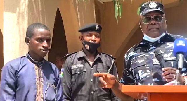 Bandit commander Rugga Bello, first left, with the police commissioner of zamfara, right