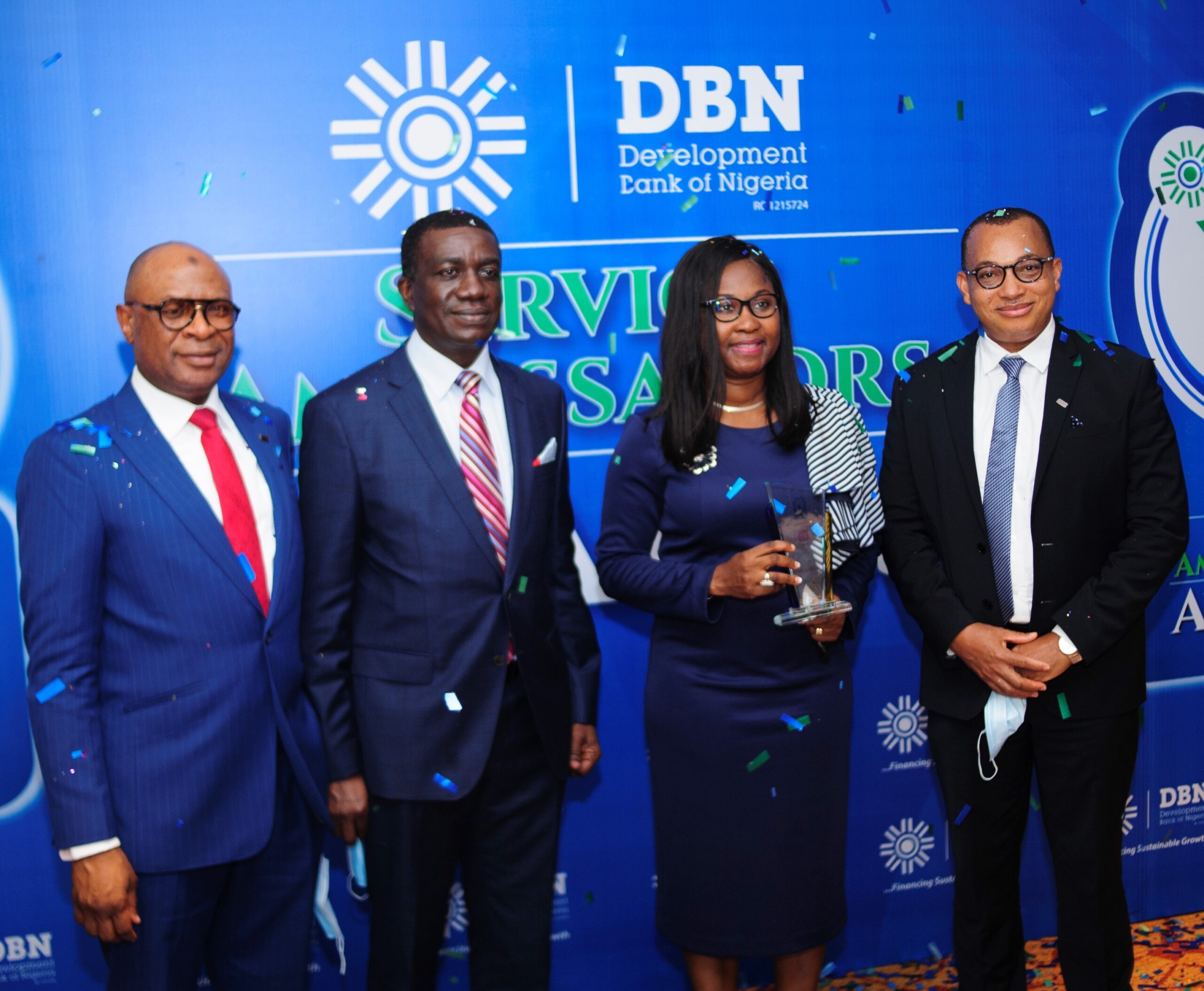 L-R): Mustapha Lukman, Divisional Head, Commercial and Business Banking Division, Managing Director/Chief Executive Officer, Tony Okpanachi, Managing Director/CEO, FCMB, Mrs. Yemisi Edun receiving the Award for the DBN Platinum Service Ambassador and Group Head, Business Banking, George Ogbonnaya recently in Lagos