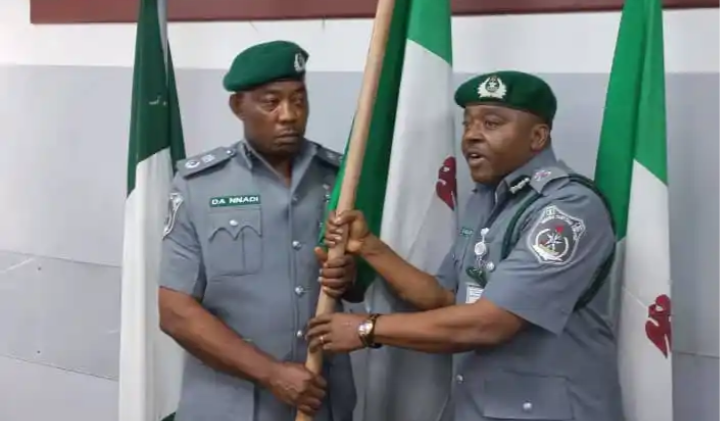 L-R: New Area Controller, Ogun 1 Customs Command, Comptroller Dera Nnadi receives mantle of leadership from his predecessor, Comptroller Peter Koko at the Command’s conference hall at Idiroko, yesterday.