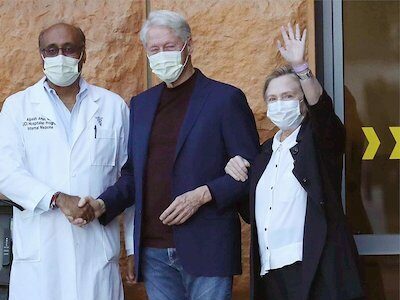 Dr Amin, Bill and Hillary Clinton at the UC Irvine Medical Centre