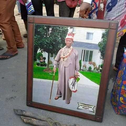 The photograph of Chief Robert Loolo, the paramount ruler of Luuwa community in Khana LG of Rivers who was abducted over two years ago carried by his family members at the place he was buried by his kidnappers