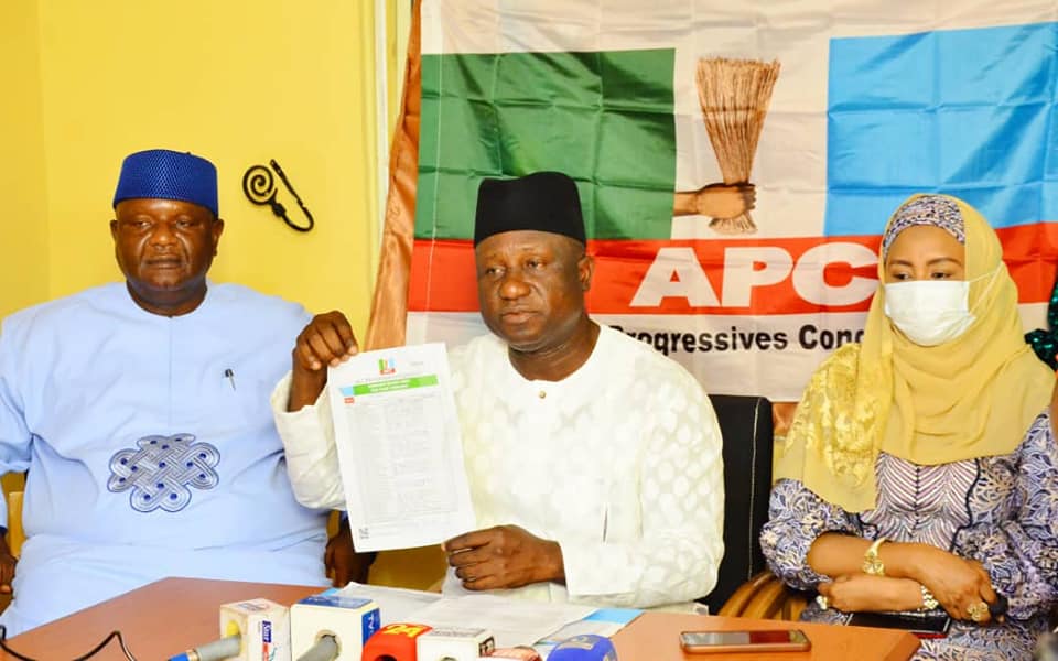 Mr Gbenga Elegbeleye, Chairman of the National Committee for Osun Congress of the APC and (left) Mr Gboyega Famodun, the re-elected as the chairman of Osun APC: Elegbeyele says the parallel state APC congress conducted by supporters of former governor Aregbesola was a funeral