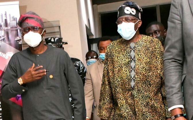 Tinubu with Sanwo-Olu on his arrival in Nigeria