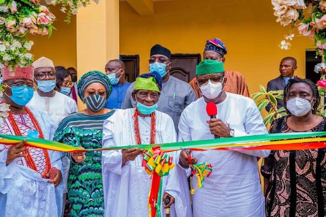 Fayemi with Deji Fasuan at the opening of the college