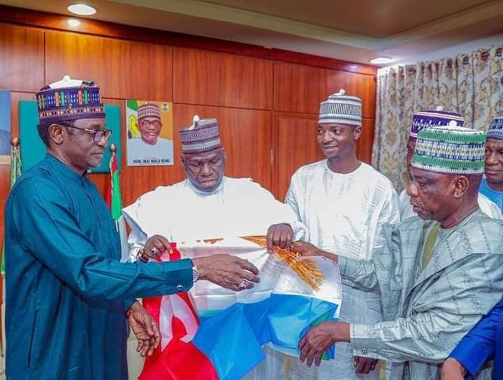 Governor Mai Mala Buni with some of the PDP defectors in Yobe