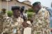The Force Commander, Multinational Joint Task Force, Maj.-Gen. Abdul-Khalifah Ibrahim decorates officer with MNJTF medal in N’djamena Chad