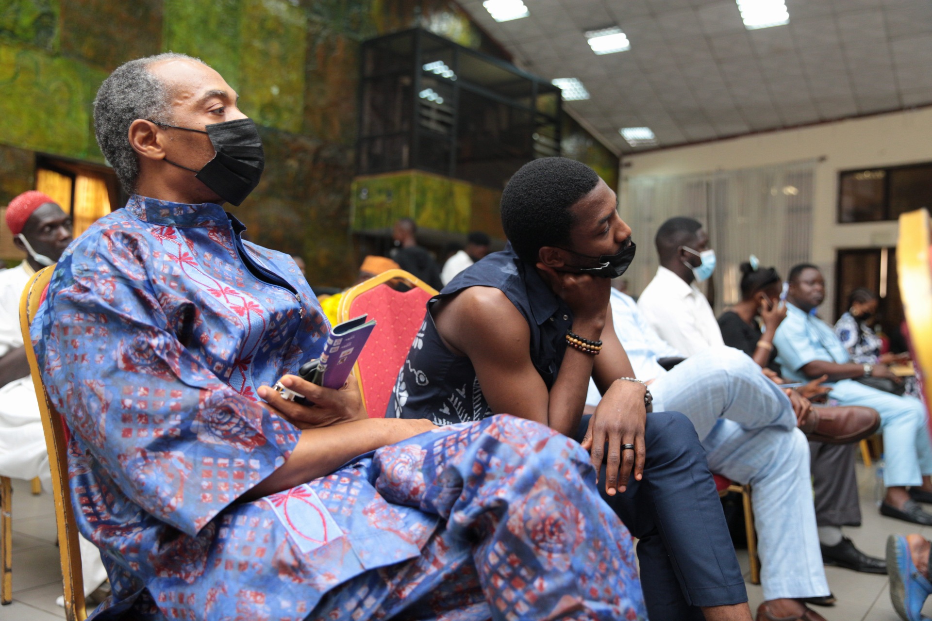 Femi Anikulapo Kuti and son, Made Kuti listening attentively to the speakers.