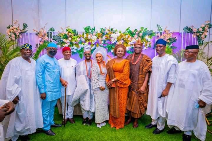 Politicians at Fayose son's wedding: L-R, Oyinlola, Fayemi, Wike, the groom and bride, the Fayoses, Makinde, Oni
