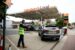 A worker guides vehicles into the forecourt as they queue to refill at a fuel station in London, Britain, Sept. 30, 2021. (Reuters photo)