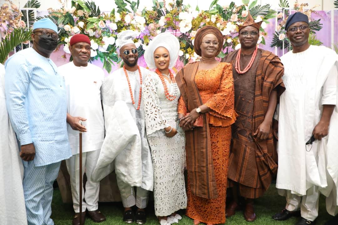 L-R: Governor of Ekiti State, Dr. Kayode Fayemi; Governor of Rivers State, Nyesom Ezenwo Wike; Oluwanigba Fayose and his wife, Olamide; Mrs. Feyisetan Fayose, former Governor of Ekiti State, Ayodele Fayose and the Governor of Oyo State, Seyi Makinde at the wedding of Oluwanigba and Olamide in Lagos on Saturday.