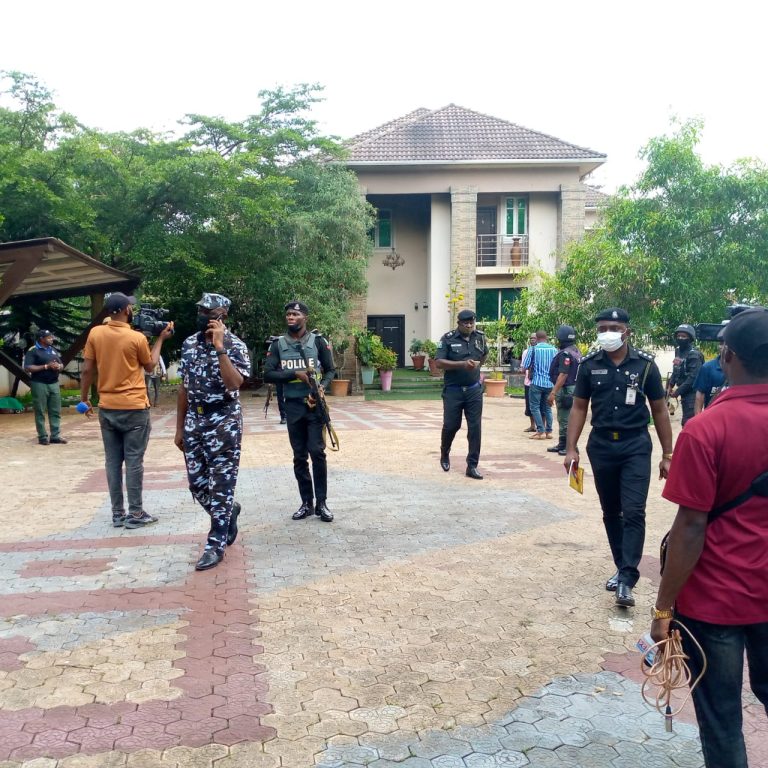 Anambra Commissioner of Police, Tony Olofu, during his visit to areas attacked by arsonists in Nnewi community on Monday