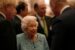 Britain’s Queen Elizabeth and Prime Minister Boris Johnson greet guests at a reception for the Global Investment Summit in Windsor Castle, Windsor, Britain, October 19, 2021. Alastair Grant/Pool via REUTERS.