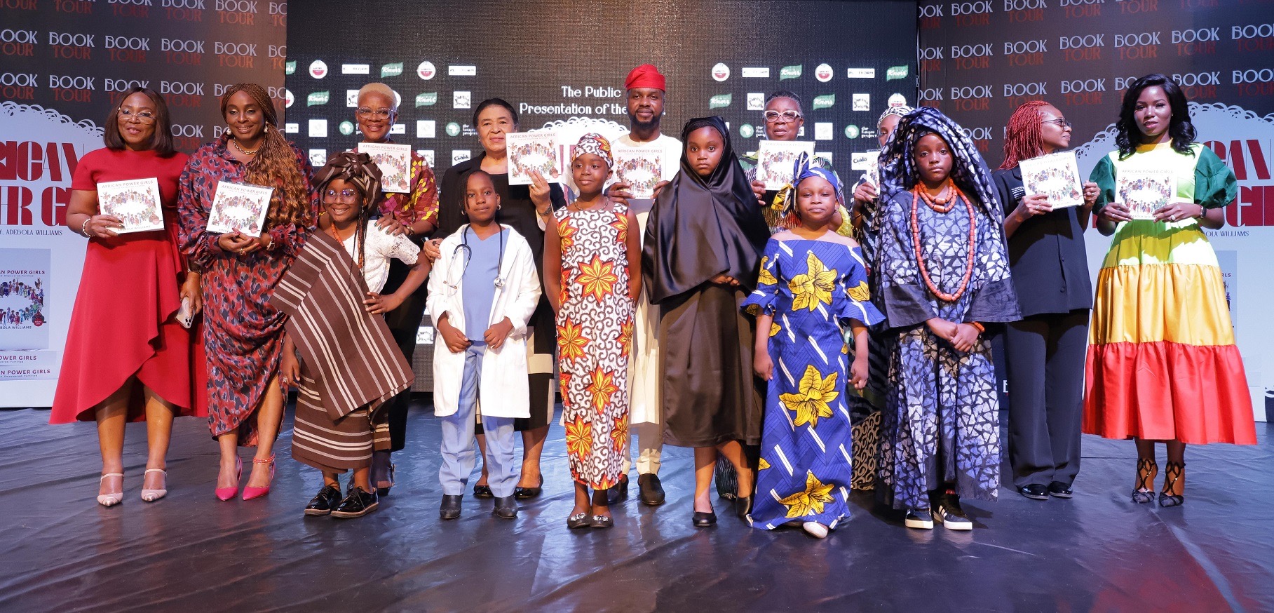 Godrey Ogbechie_ Osayi Alile_ Adesuwa Onyenokwe_ Ajoritsedere Awosika_ Adebola Williams_ Folashade Adefisayo_ Kadaria Ahmed_ Nse Ikpe-Etim_ kehinde Williams and children at the launch of African Power G
