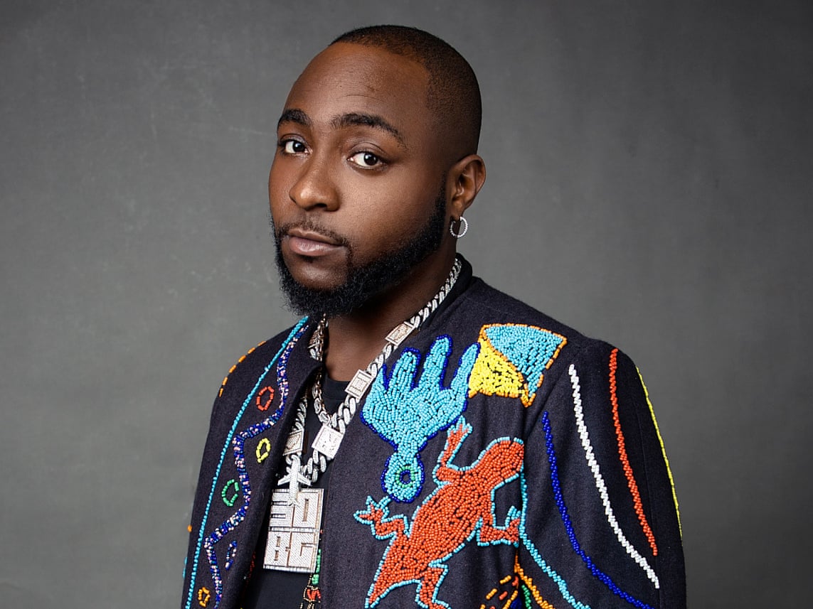 Davido in shock, replies Burna Boy fan wishing him death