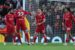 Liverpool players celebrate one of their goals