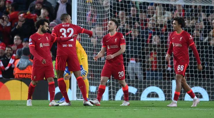 Liverpool players celebrate one of their goals