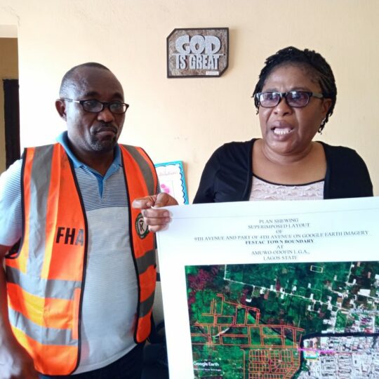 Mr Alaba Omoniyi South West Zonal Head, Legal Department, Federal Housing Authority (FHA), and Mrs Francisca Michael-James, FHA’S Head, Town Planning, South-West Zone