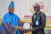 Oluwo of Iwo, Oba Abdulrosheed Akanbi Presenting CRAN's award of 'Excellence Award In Police Legal Services', to Barr. Morufu Ajani Animashaun, at the 2021 CRAN Annual Lecture/Award Ceremony, held recently in Lagos