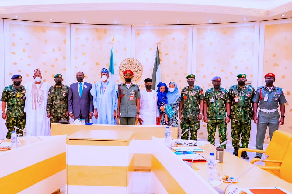 Buhari with security chiefs and others