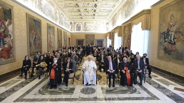 Pope Francis flanked by journalists Valentina Alazraki (L) and Philip Pullella (R). (Vatican Media)