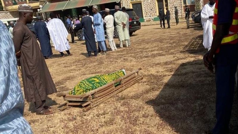 All alone: Sani Dangote's body on the floor before the funeral