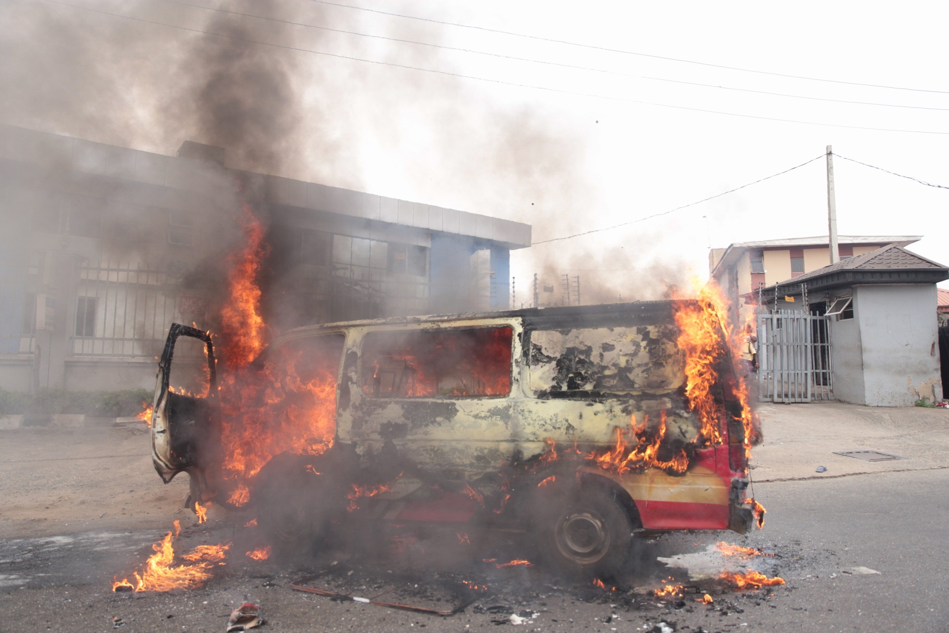 A bus set ablaze by the students