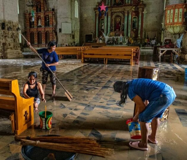 A flooded church being cleared in Loboc in the Philippines