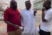 Davido, Dangote and another man chatting at the airport