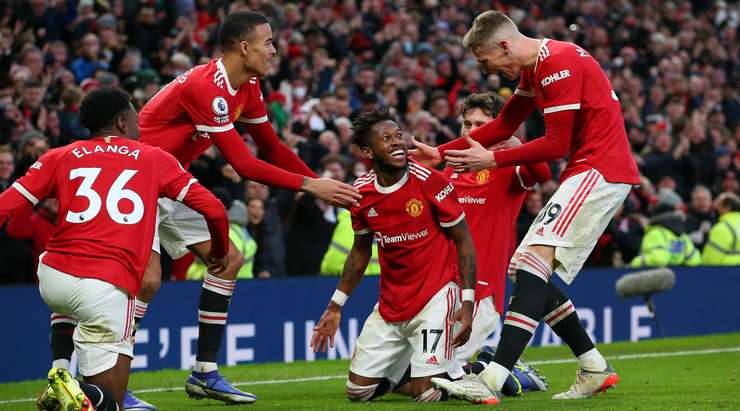 Fred celebrates his goal with team mate