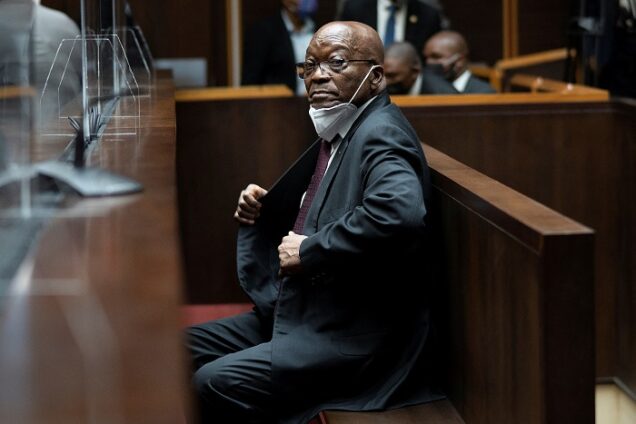 Former South African President Jacob Zuma sits in court during his corruption trial in Pietermaritzburg