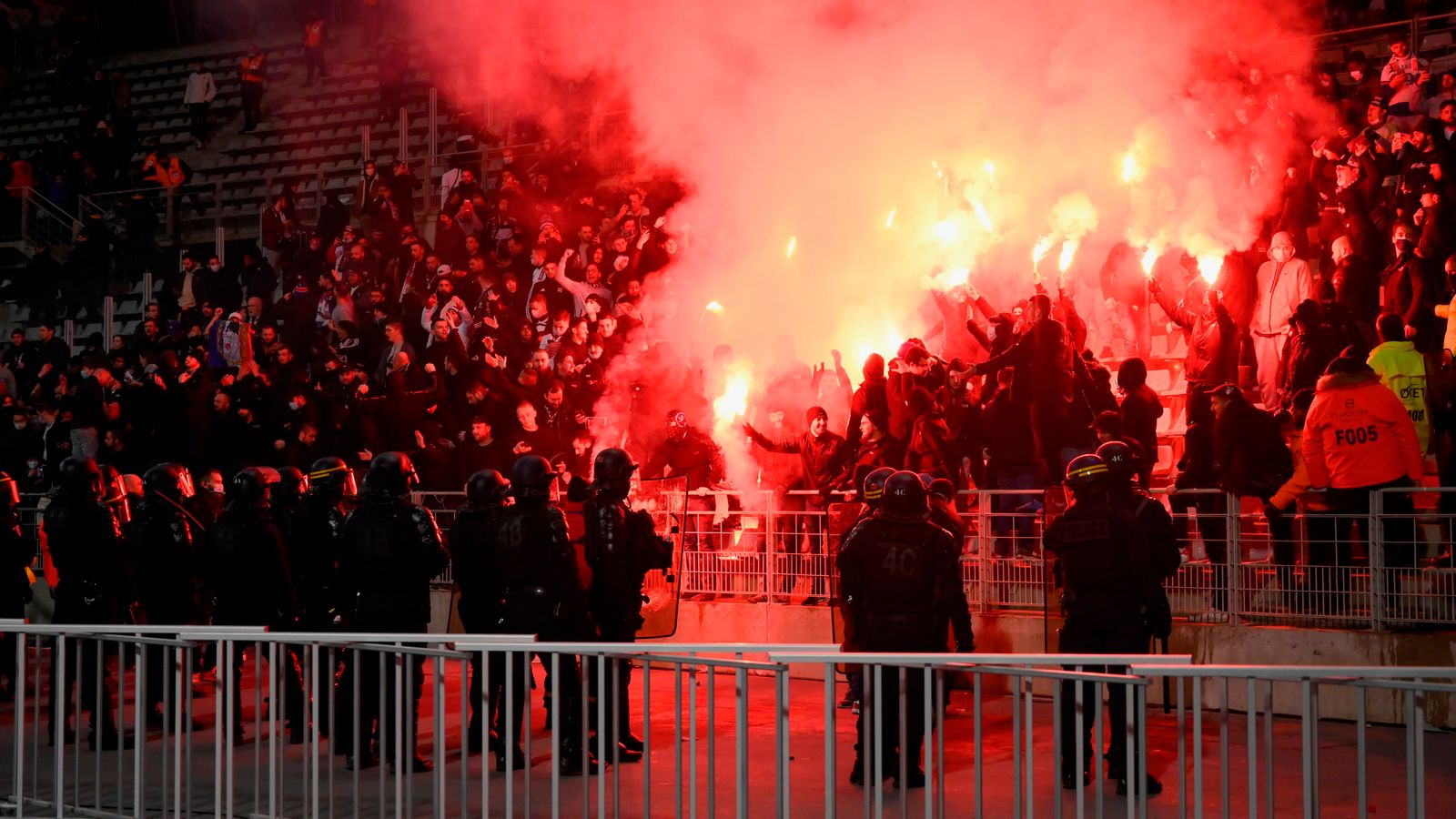 Lyon and Paris FC thrown out of French Cup over crowd trouble