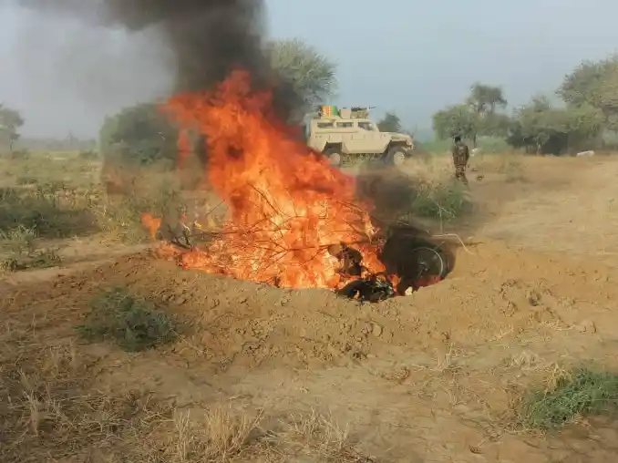 One of the gun trucks belonging to suspected terrorists being destroyed by Multinational Joint Task Force (MNJTF) troops during OP Sharan Fage 