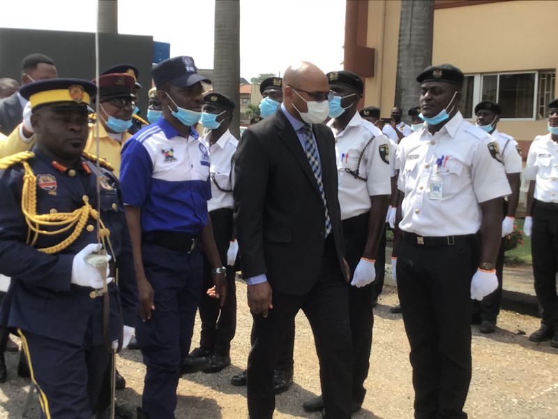 Permanent Secretary, Chief of Staff, Wale Musa inspecting guard of honour at the passing out parade of trained law enforcement officers in Lagos. With him is LETI CEO, Dr. Adegboyega Bajulaiye