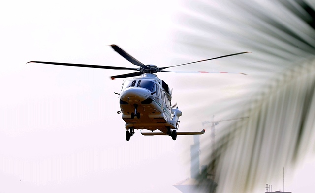 NAF helicopter conveying the president about to land at the State House, Abuja.