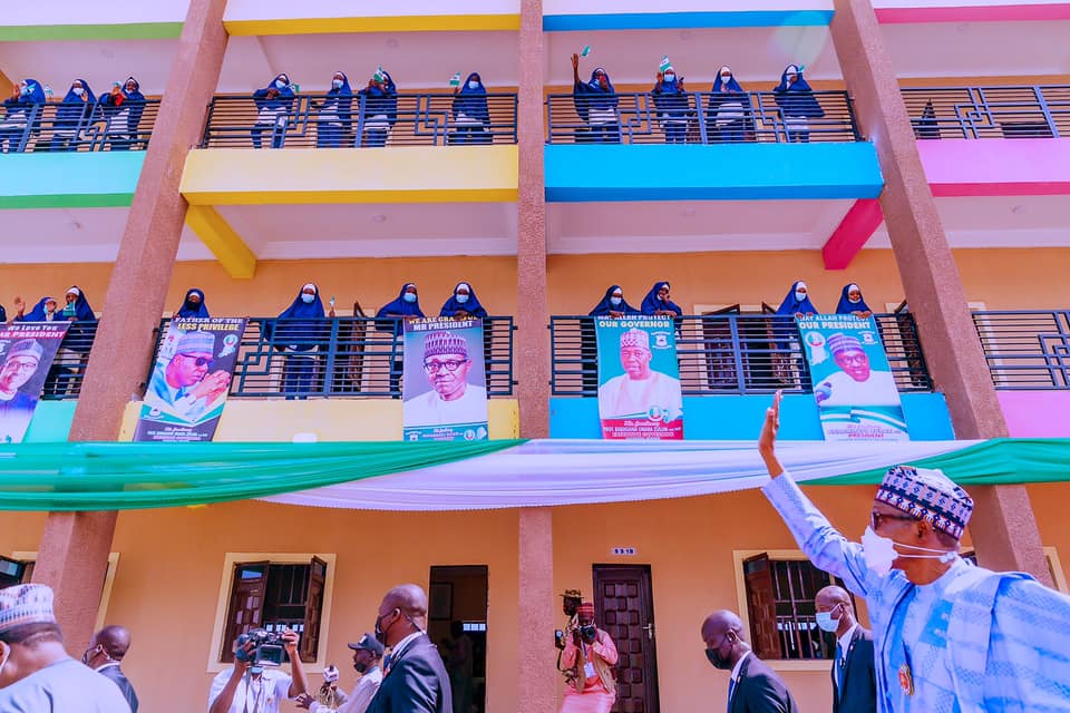 Buhari waving to students